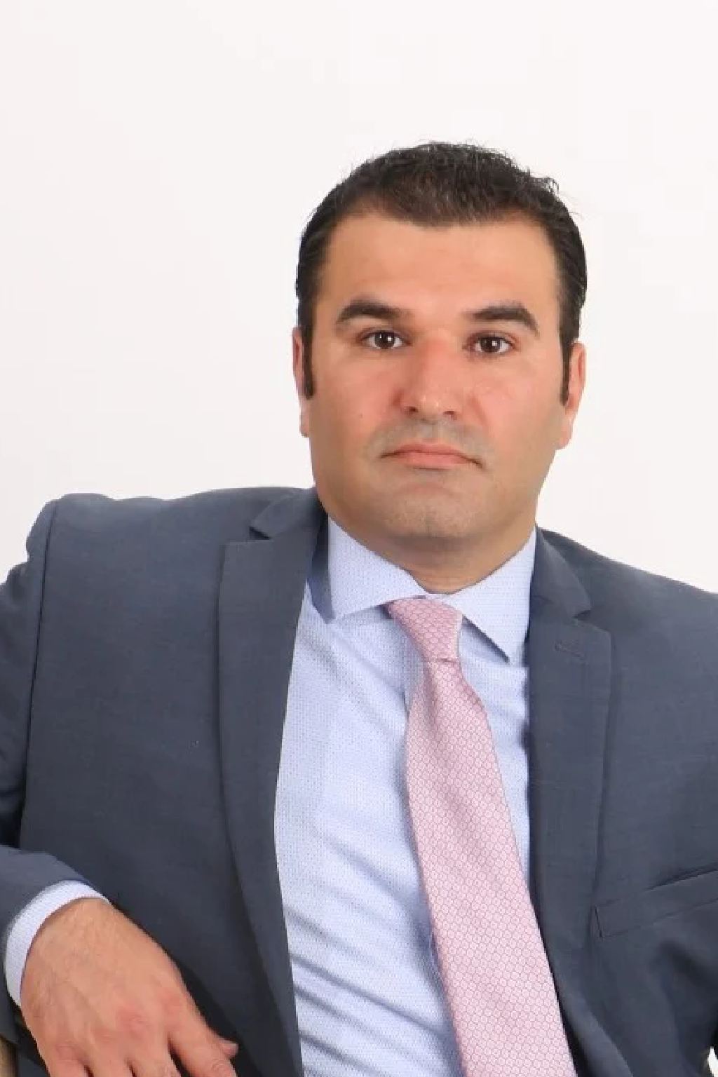 Babak Garakani from KMA Accounting and Tax Services in a professional suit